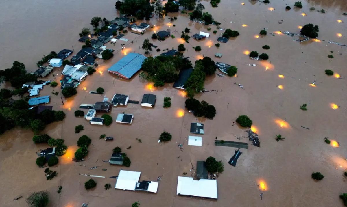 gestão de crise de marcas. a imagem ilustra a tragédia no rio grande com alagamento de casas ilhadas